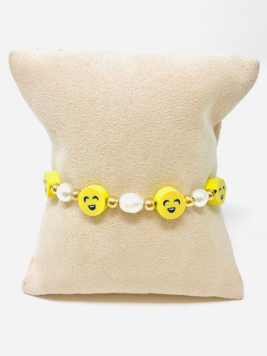 PULSERA CARITA FELIZ PERLA